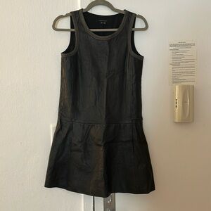 Leather mini sleeveless dress with grey wool lining